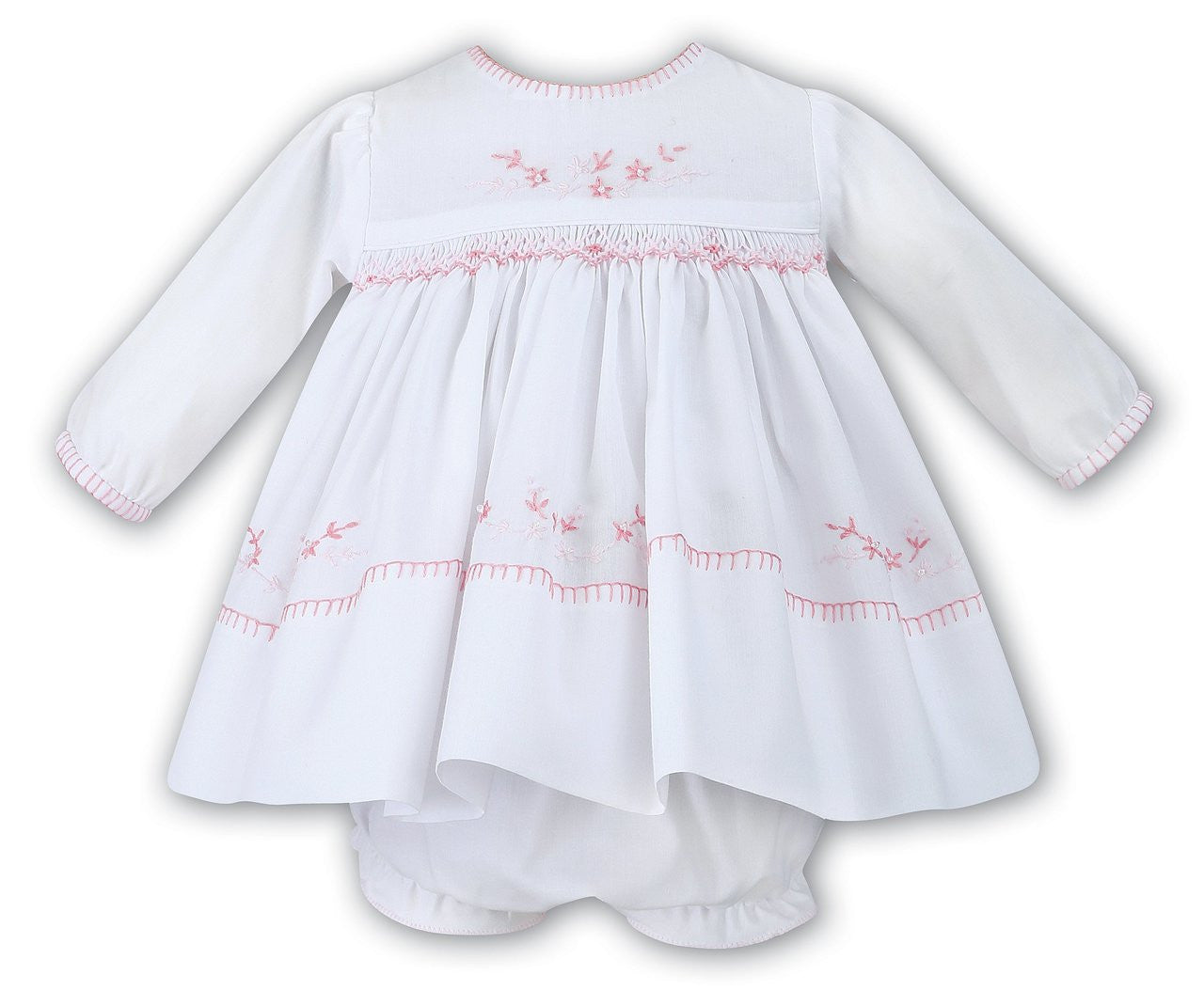White smocked long sleeve dress
